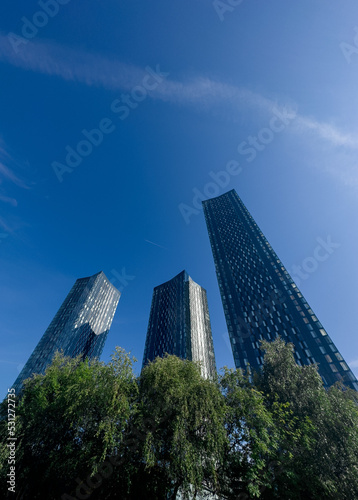Fototapet Manchester City Centre Modern skyscrapers with a blue sky background Building Wo