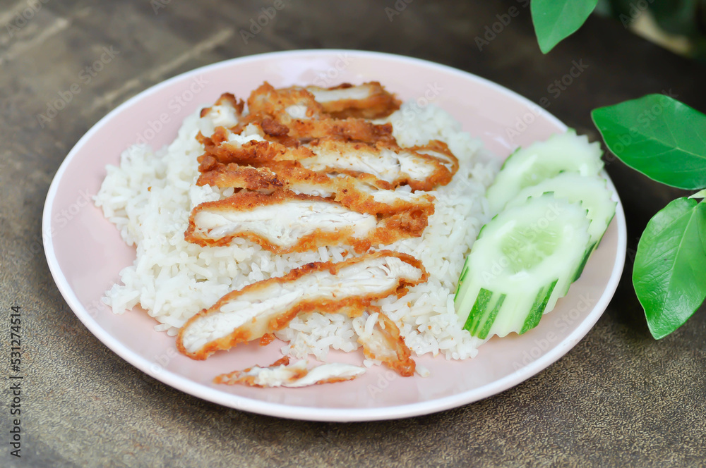 rice topped with chicken or chicken rice or fried chicken and rice rice topped with chicken or chicken rice or fried chicken and rice