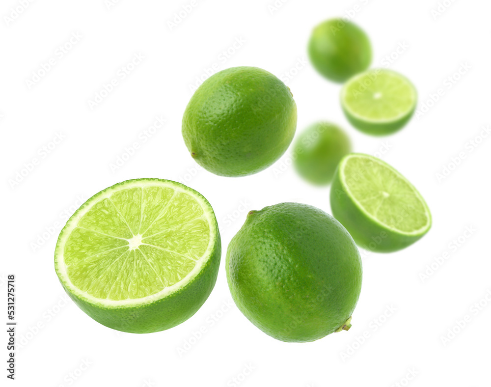 Fresh Green lime with cut in half levitate isolated on white background.
