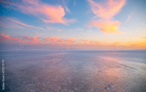 Picturesque salt pink lagoon at sunset on a beautiful summer evening. Black Sea  Ukraine  Europe.