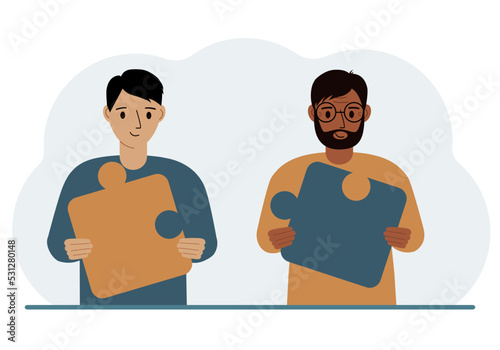 Team metaphor. People putting puzzle pieces together. The concept of teamwork and cooperation. Business concept.