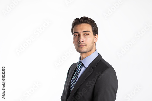 Handsome confident businessman in black suit isolated on white background