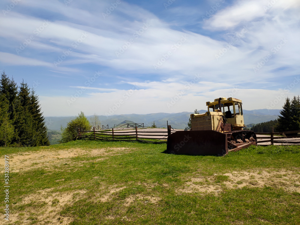 Fototapeta premium Tractor in the Ukrainian Carpathians