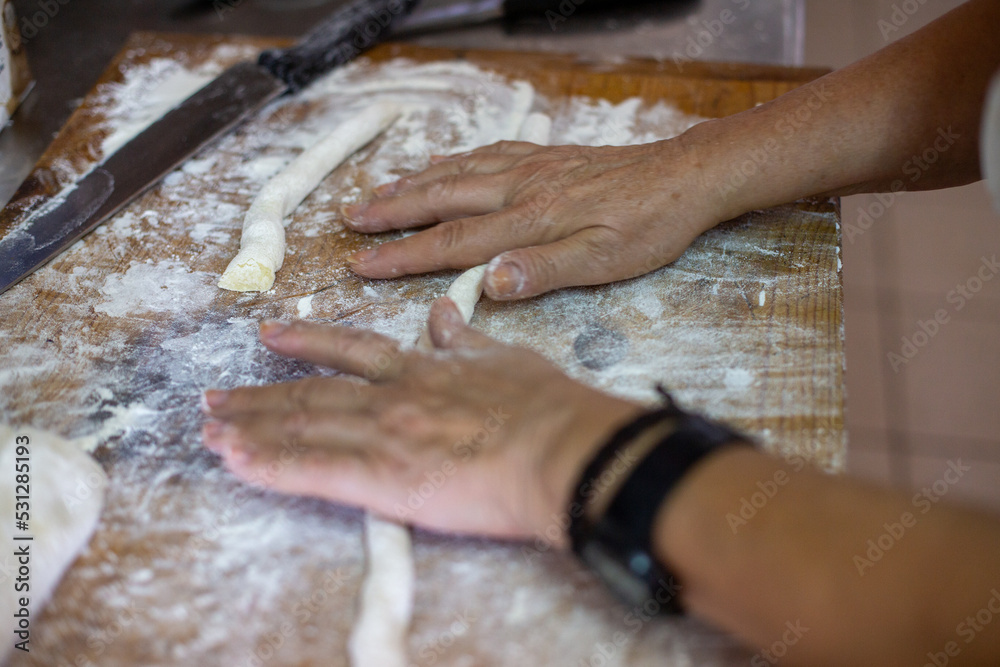 baker kneading dough baker kneading dough