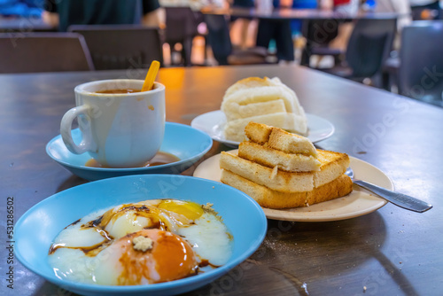 Photography Traditional breakfast set and coffee, boiled eggs and toast, popular in Singapor