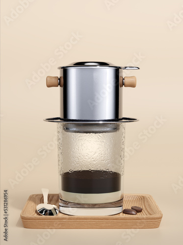 the isolated Vietnamese drip phin filter  on a wood tray photo