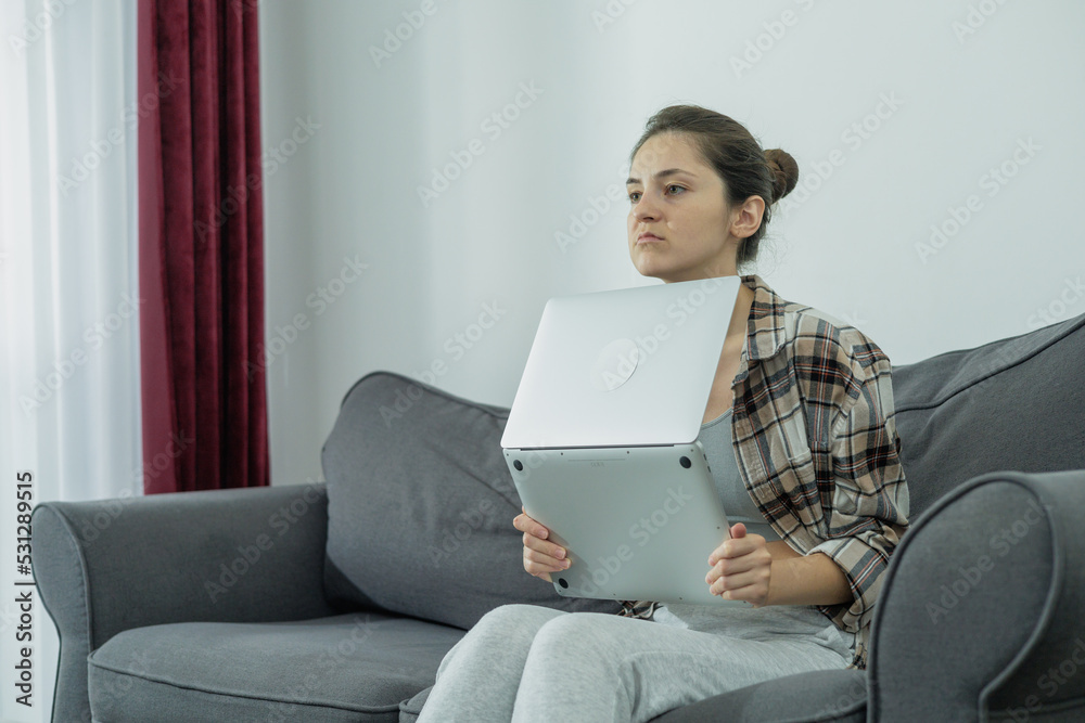 Beautiful smiling girl. Shopping online. Millennials. Working girl at the computer, Beautiful smiling girl. Shopping online. Millennials. Working girl at the computer,