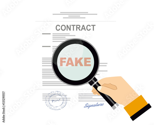 Fake contract with magnifying glass 