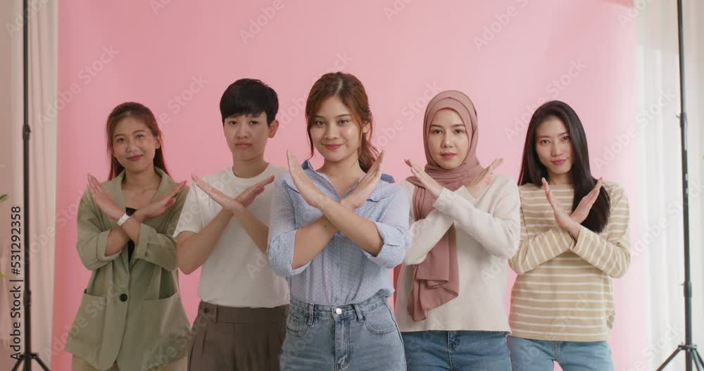 Diverse group of asia Gen z girl arm cross break the bias happy face look at camera in model shooting studio shot. Power of woman's day right or gay youth LGBT pride unity team strong cool proud smile Diverse group of asia Gen z girl arm cross break the bias happy face look at camera in model shooting studio shot. Power of woman's day right or gay youth LGBT pride unity team strong cool proud smile
