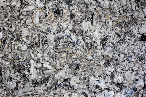Close-up surface texture photo of burned ashes.