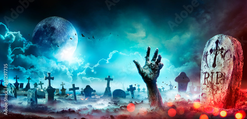 Fotografie, Obraz Zombie Hand Rising Out Of A Graveyard At Night With Full Moon
