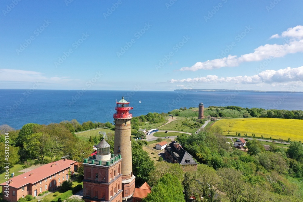 The island Ruegen Germany with many rape fields and lighthouse