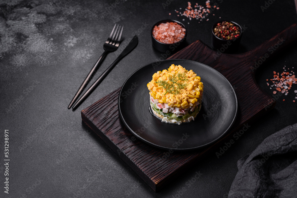 Fresh vegetable salad with corn, pepper, crab, cucumber, eggs and mayonnaise Fresh vegetable salad with corn, pepper, crab, cucumber, eggs and mayonnaise