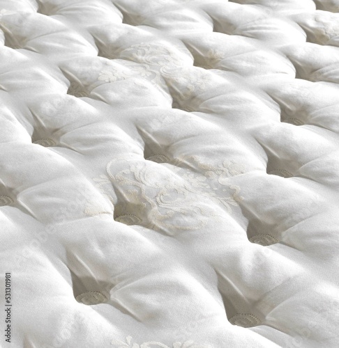 Abstract antique damask top view mattress , close up mattress with , background of comfortable bed , quilted white fabric .