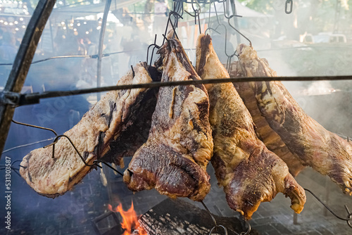 Pieces of beef carcass on the grill  traditional Argentinean food