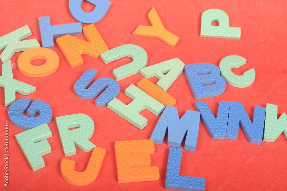alphabet on red background
alphabet on red background