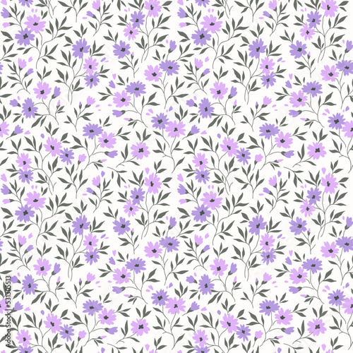 Cute floral pattern in the small flowers. Seamless vector texture. Elegant template for fashion prints. Printing with small lilac purple flowers. White background.