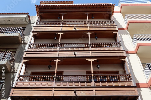 Icod de los Vinos, Tenerife, Canary Islands, Spain, September 17, 2022: Typical wooden balconies in a house in the center of Icod de los Vinos, Tenerife, Spain