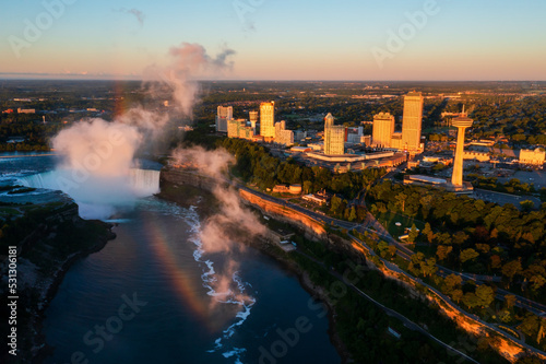 Aerial view on Niagara falls and Ontario city with rainbow