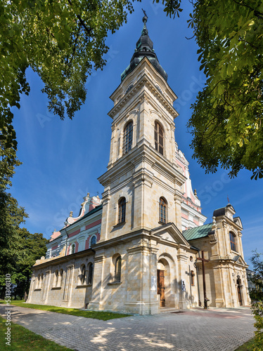 Our Lady of Dzikow Sanctuary and Dominican order monastery in town quarter of historic center of Tarnobrzeg in Poland photo