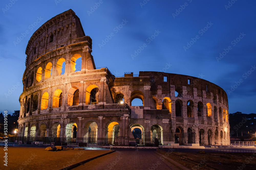Roman Colosseum at sunrise with clouds, no people