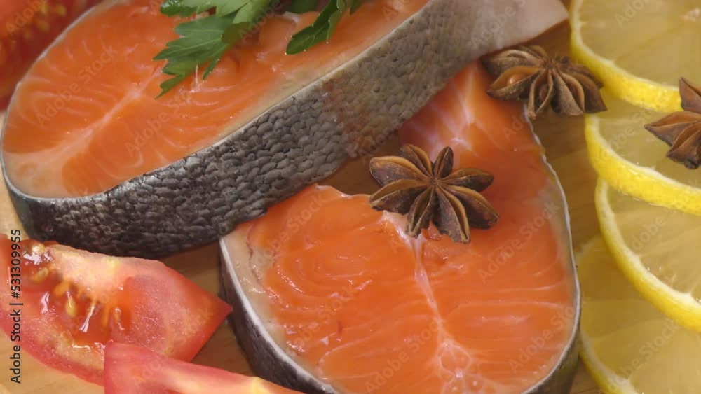 Trout steak (Latin. Salmo trutta) with fresh vegetables Trout steak (Latin. Salmo trutta) with fresh vegetables