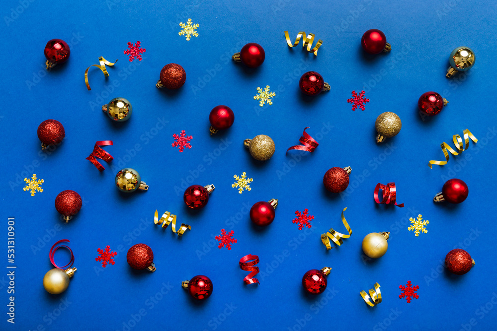 Christmas composition. a pattern of christmas balls on colored background. Flat lay, top view New year decor Christmas composition. a pattern of christmas balls on colored background. Flat lay, top view New year decor