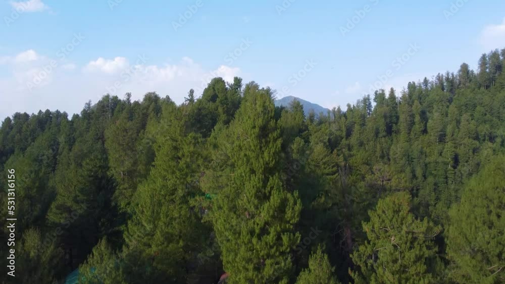 Arial shot of beautiful huts in forest in hilly area of Pakistan Arial shot of beautiful huts in forest in hilly area of Pakistan