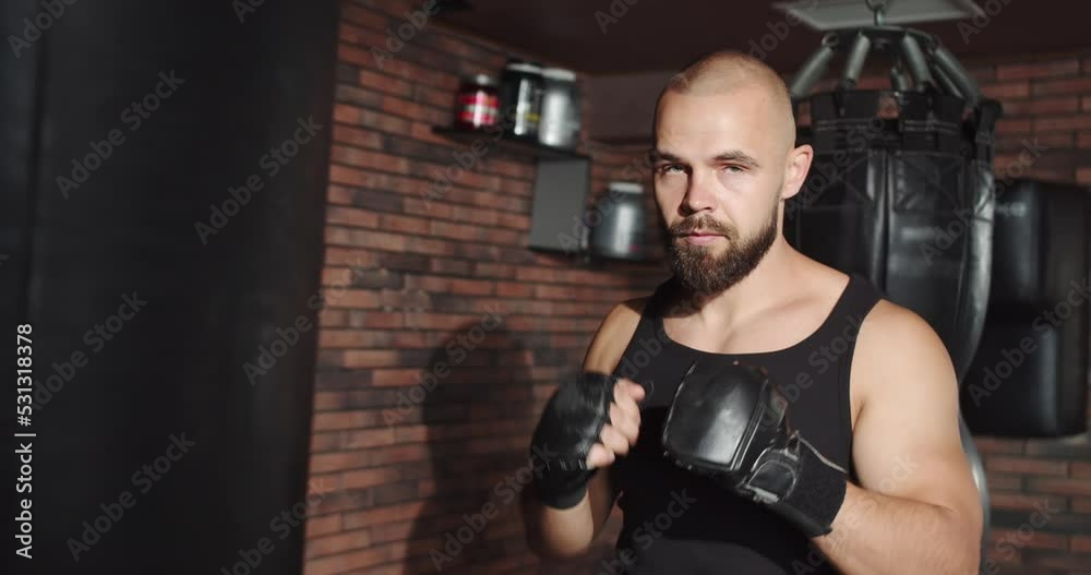 The athlete does boxing in the gym The athlete does boxing in the gym