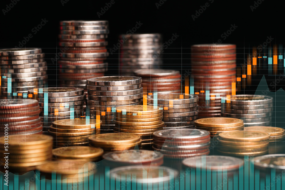 coin stacks and candlestick forex chart. Trade, money and financial growth and business concept. Double exposure coin stacks and candlestick forex chart. Trade, money and financial growth and business concept. Double exposure