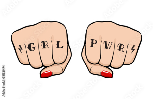 Female fist with Girl Power tattoo on fingers, front view of a woman fist with tattoo and polished nails