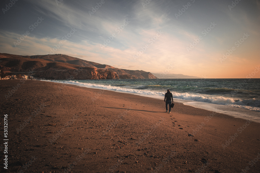 Man Walking on the beach
