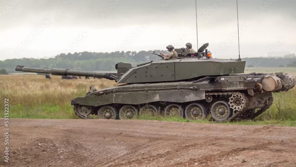 custom made wallpaper toronto digitalclose up of a british army challenger ii 2 FV4034 main battle tank crossing a track in to woodland in action on a military exercise