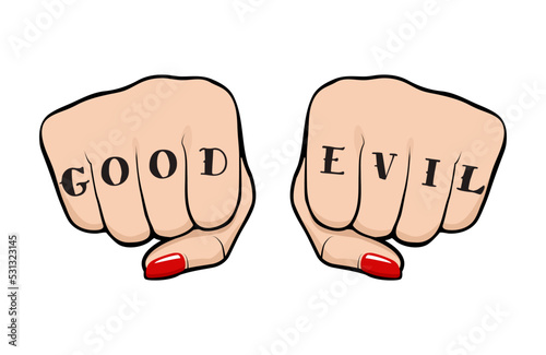Female fist with Good and Evil tattoo on fingers, front view of a woman fist with tattoo and polished nails