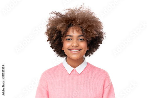 Studio portrait of smiling african teen girl with curly afro hairstyle isolated