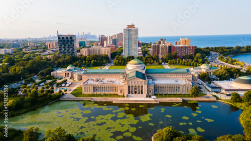 Chicago, IL USA September 16th 2022: Aerial drone footage of the Chicago Museum of Science and industry during the summer time. the view from above is beautiful with the lake water full of life