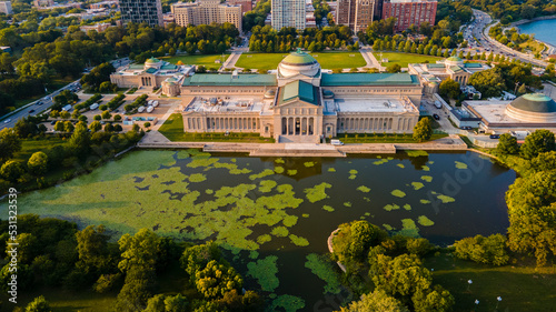Chicago, IL USA September 16th 2022: Aerial drone footage of the Chicago Museum of Science and industry during the summer time. the view from above is beautiful with the lake water full of life