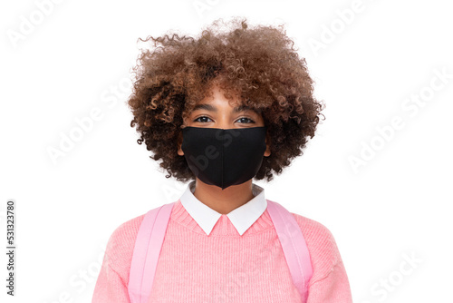 Portrait of smiling african american school girl or college student with curly afro hair wearing black cotton mask, isolated