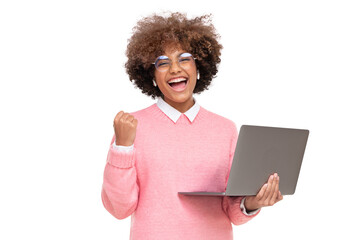 She is a winner! Excited young girl with laptop