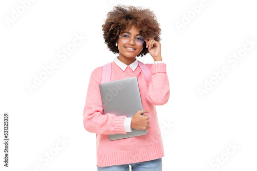 Studio portrait of smiling african american teen girl, online course or high school student holding glasses and laptop photo