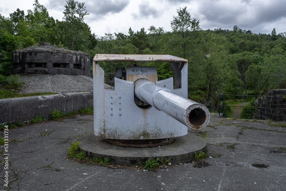 Bergen, Norway - June 15, 2022: Kvarven coastal fort is a German coastal fort from World War II, strategically located by the main shipping channel of the Byfjorden leading to Bergen. Selective focus Bergen, Norway - June 15, 2022: Kvarven coastal fort is a German coastal fort from World War II, strategically located by the main shipping channel of the Byfjorden leading to Bergen. Selective focus