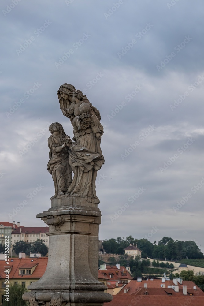 Bronze sculpture on the Charles Bridge in Prague, Czech Republic, Bohemia