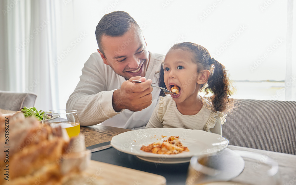 Father feed lunch food to girl for support with health, child development and growth while relax at home. Eating meal, dad or man feeding kid daughter while happy and enjoy quality time together