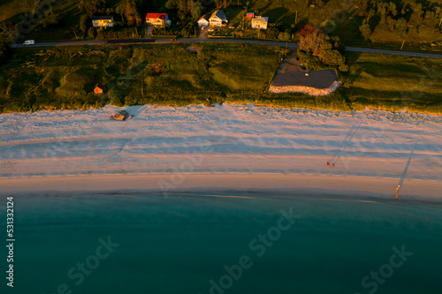 Sunset on Ramberg Beach, in the Lofoten Archipelago photo