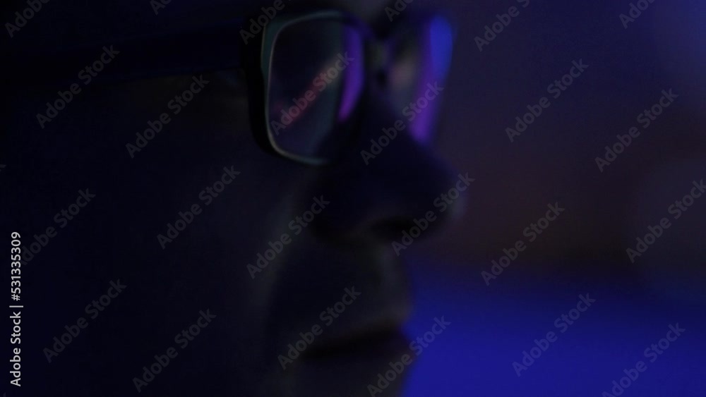 pulse of the market, a male trader with glasses sits in front of the monitor and looks at the chart of the market price of stocks or currencies, the securities market or the crypto exchange pulse of the market, a male trader with glasses sits in front of the monitor and looks at the chart of the market price of stocks or currencies, the securities market or the crypto exchange