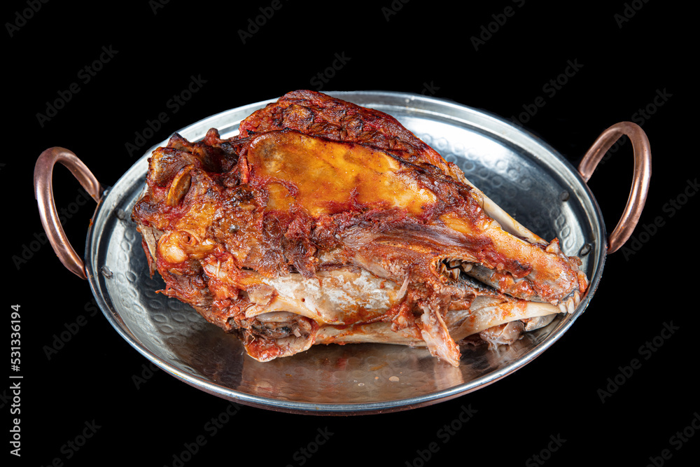 Roasting head of a lamb. Traditional Turkish Offal Food Kelle Sogus