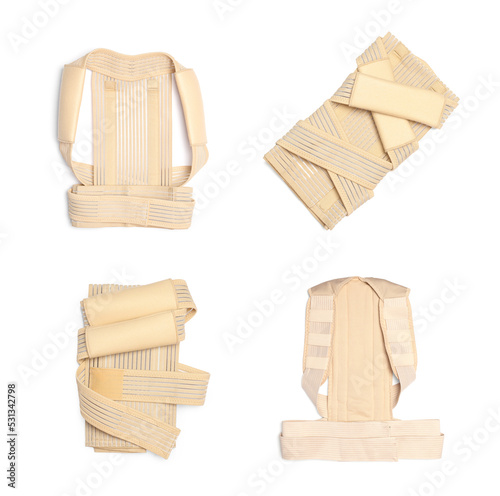 Set with orthopedic corsets on white background, top view