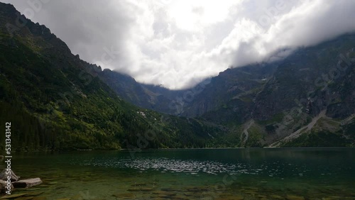 Morskie Oko (Sea Eye) is largest and fourth-deepest lake in Tatra Mountains. It is located deep within Tatra National Park, Poland, in Rybi Potok (Fish Brook) Valley, at base of Mieguszowiecki Summits photo