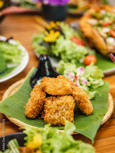 Deep fried mince pork toast. Thai food, an appetizer served on the banana leaf.