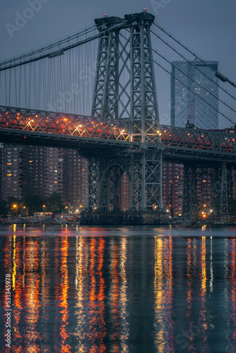 Fototapeta Naklejka Na Ścianę i Meble -  city bridge at night sunrise Williamsburg Bridge New York City reflections lights 